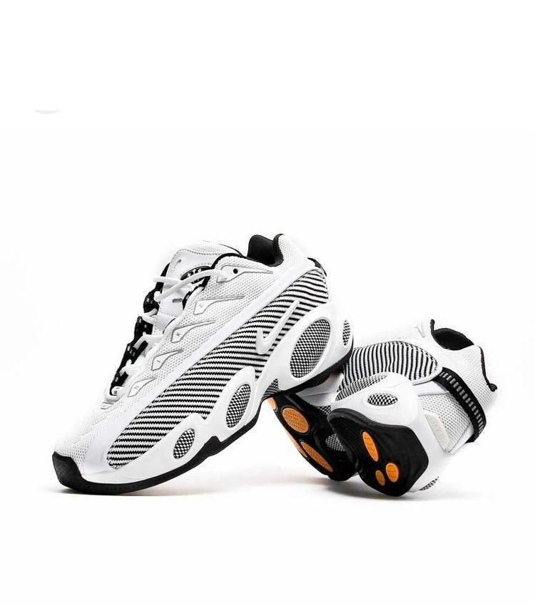 Nike NOCTA Glide Blanc-Noir avec des semelles Blanches